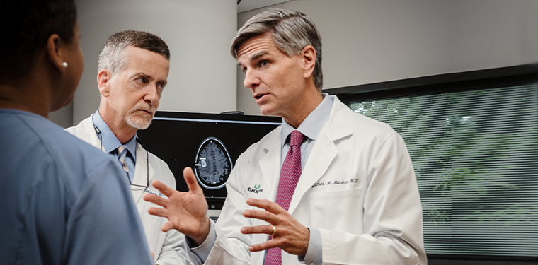 Doctors discussing a patient